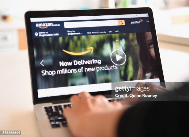 The Amazon website is seen on December 5, 2017 in Dandenong, Australia. Amazon has ended months of speculation by launching its local website...