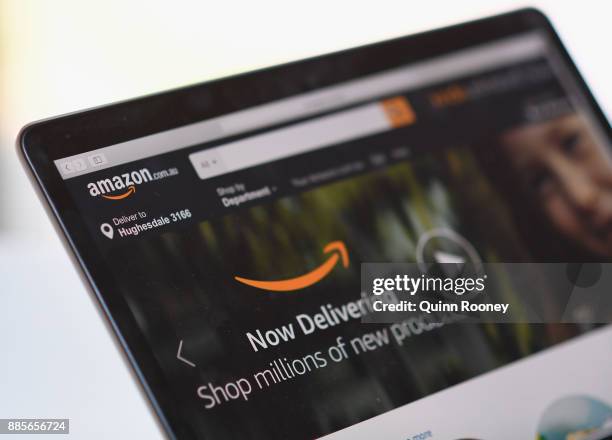 The Amazon website is seen on December 5, 2017 in Dandenong, Australia. Amazon has ended months of speculation by launching its local website...