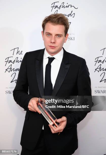 Anderson poses in the winners room with the British Designer of the Year award for Womenswear during The Fashion Awards 2017 in partnership with...