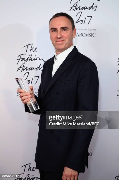 Raf Simons with the Designer of the Year Award in the winners room during The Fashion Awards 2017 in partnership with Swarovski at Royal Albert Hall...