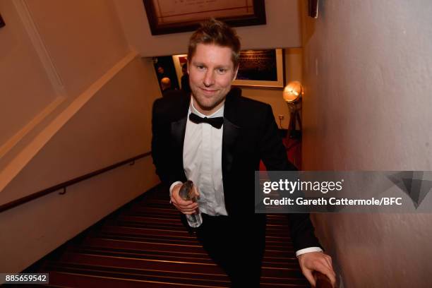 Christopher Bailey, winner of the Outstanding Contribution to British Fashion Award backstage during The Fashion Awards 2017 in partnership with...