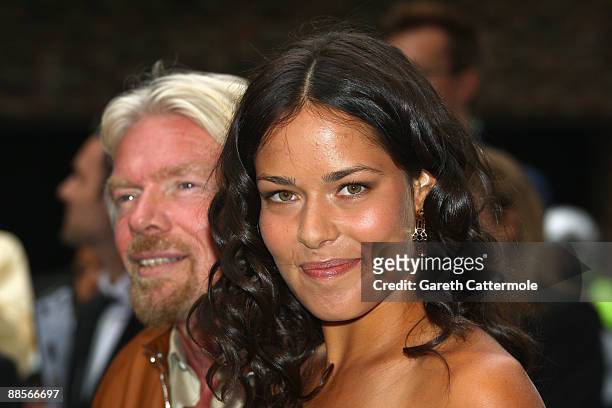Tennis player Ana Ivanovic and Sir Richard Branson arrive at The Ralph Lauren Sony Ericsson WTA Tour Pre-Wimbledon Party at The Roof Gardens on June...