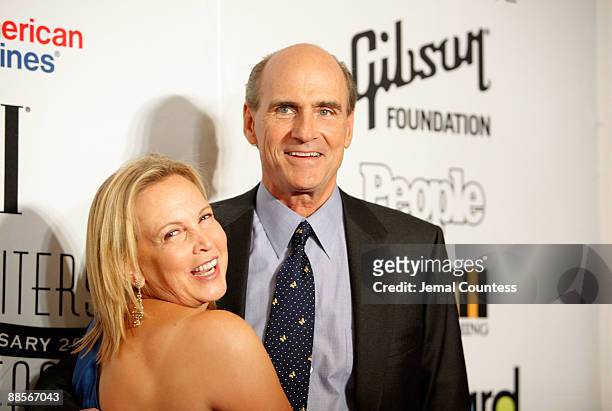 Singer/songwriter James Taylor and wife Caroline "Kim" Taylor walk the red carpet during the 40th Annual Songwriters Hall of Fame Ceremony at The New...