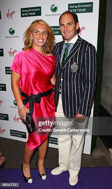 Larry Scott and tennis player Svetlana Kuznetsova arrive at The Ralph Lauren Sony Ericsson WTA Tour Pre-Wimbledon Party at The Roof Gardens on June...