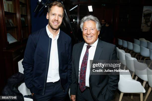 Quadruple World Champion Formula 1 Driver Sebastian Vettel and 1978 World Champion Formula 1 Mario Andretti attend the FIA Hall of Fame Induction...