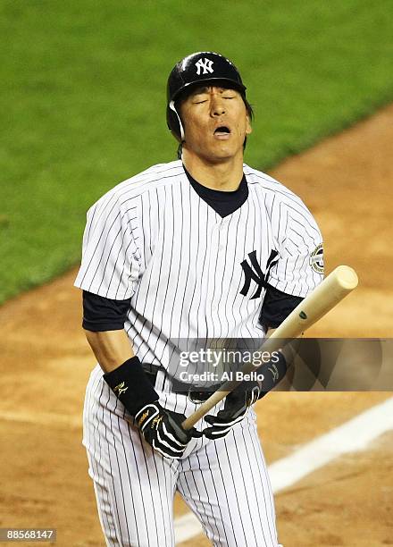 Hideki Matsui of the New York Yankees reacts after striking out with men on base against the Washington Nationals during their game on June 18, 2009...