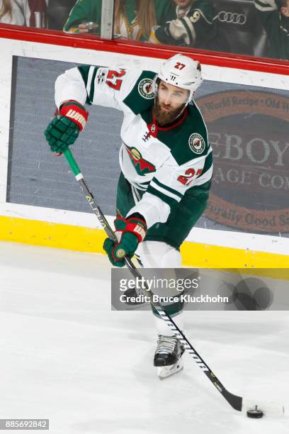 Kyle Quincey of the Minnesota Wild passes the puck against the Colorado Avalanche during the game at the Xcel Energy Center on November 24, 2017 in...