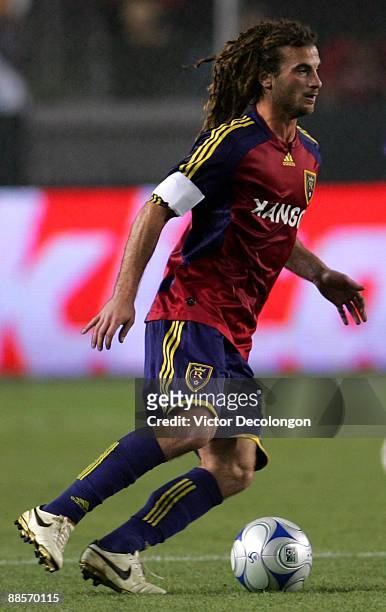 Kyle Beckerman of Real Salt Lake looks to make a play with the ball during the MLS match against the Los Angeles Galaxy at The Home Depot Center on...