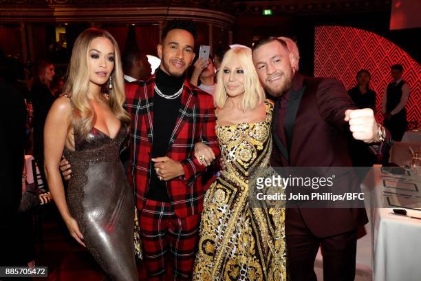 Singer Rita Ora, F1 Driver Lewis Hamilton, designer Donatella Versace and MMA Fighter Connor McGregor are seen at The Fashion Awards 2017 in...