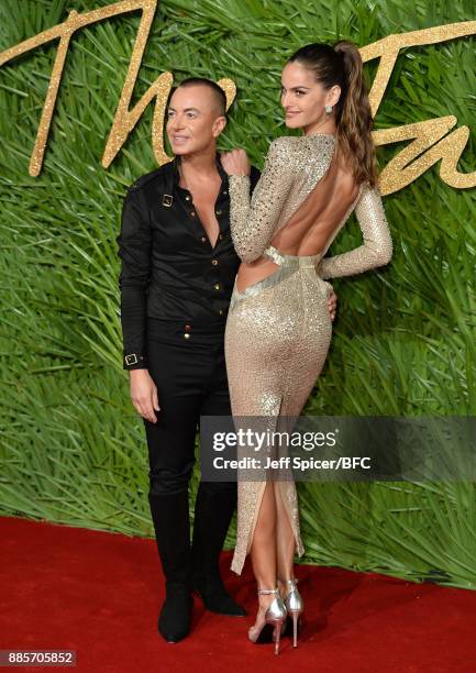 Julien Macdonald and Izabel Goulart attends The Fashion Awards 2017 in partnership with Swarovski at Royal Albert Hall on December 4, 2017 in London,...