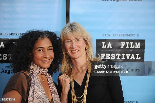 Actresses Laura Dern and Bellina Logan arrive for the world premiere of "Paper Man," the opening night presentation of the Los Angeles Film Festival,...