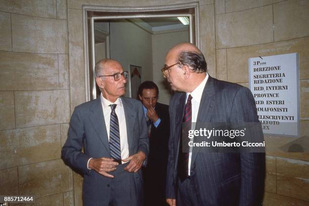 Italian politician Bettino Craxi is with Italian journalist and historian Indro Montanelli at the headquarters of newspaper "Il Giornale", Milan 1990.