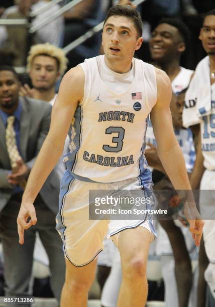 North Carolina Tar Heels guard Andrew Platek looks up at the video screen after making a three point shot during the game between the Tulane Green...