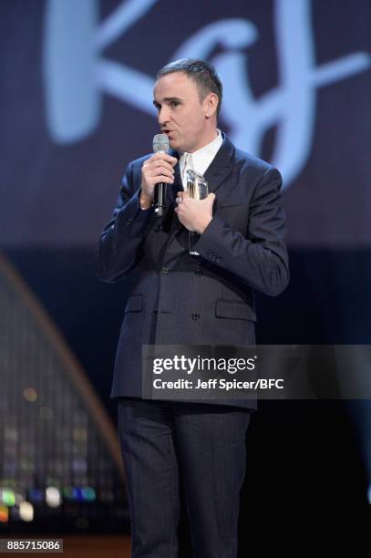 Raf Simons accepts his award during The Fashion Awards 2017 in partnership with Swarovski at Royal Albert Hall on December 4, 2017 in London, England.