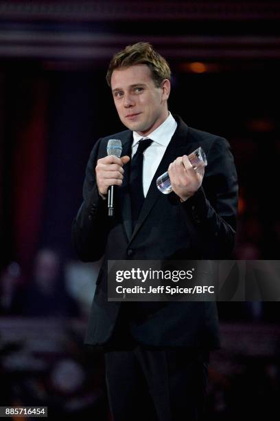 Anderson accepts an award during The Fashion Awards 2017 in partnership with Swarovski at Royal Albert Hall on December 4, 2017 in London, England.