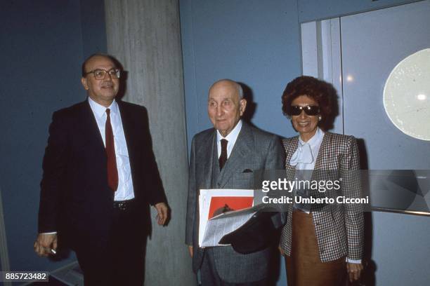 Italian politician Bettino Craxi is with his father Vittorio Craxi and his wife Anna Maria Moncini in Milan in 1989.
