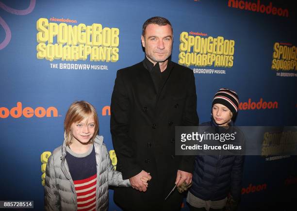 Liev Schreiber and sons pose at the opening night arrivals for the new musical "Spongebob Squarepants" on Broadway at The Palace Theatre on December...