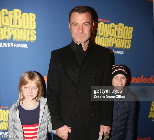 Liev Schreiber and sons pose at the opening night arrivals for the new musical "Spongebob Squarepants" on Broadway at The Palace Theatre on December...