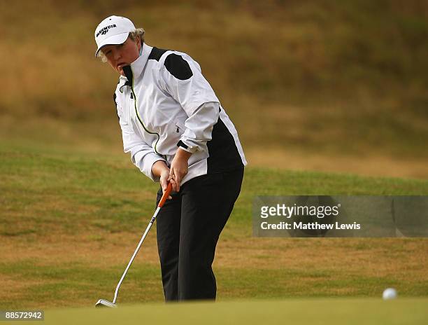 Alison Gray of Ormskirk makes a putt on the 1st green during the Glenmuir PGA Professional Championship at Dundonald Links on June 19, 2009 in...