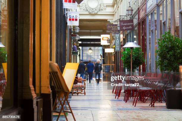 the passage verdeau. beautiful parisian shopping gallery - tourism drop in paris stock pictures, royalty-free photos & images