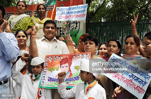 Congress Party supporters gather as they celebrate Congress Party General Secretary Rahul Gandhi's 40th Birthday in front of Congress Party President...