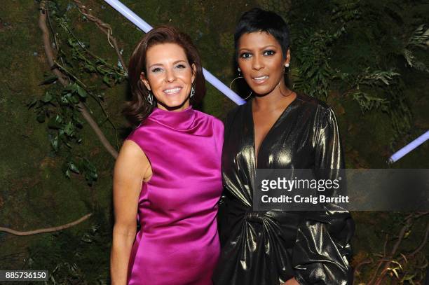 Journalists Stephanie Ruhle and Tamron Hall attend "The Bloomberg 50" Celebration at Gotham Hall on December 4, 2017 in New York City.