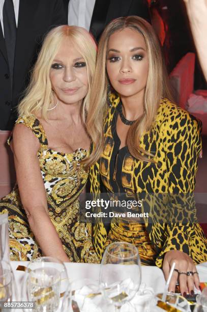 Donatella Versace and Rita Ora attend The Fashion Awards 2017 in partnership with Swarovski after party at Royal Albert Hall on December 4, 2017 in...