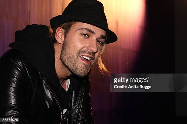 German violinist David Garrett poses for the photographers during a press conference in order to promote his new album 'Encore' and his upcoming tour...