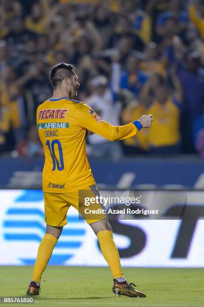 Andre-Pierre Gignac of Tigres celebrates his team's second goal scored by Enner Valencia during the semifinal second leg match between Tigres UANL...