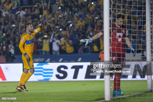 Andre-Pierre Gignac of Tigres celebrates after scoring his team's third goal during the semifinal second leg match between Tigres UANL and America as...