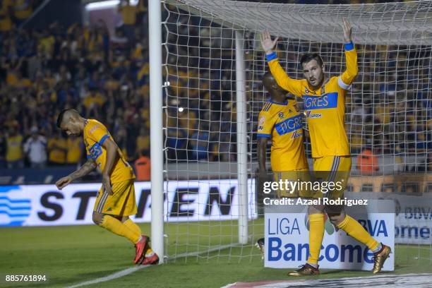 Andre-Pierre Gignac of Tigres celebrates after scoring his team's third goal during the semifinal second leg match between Tigres UANL and America as...