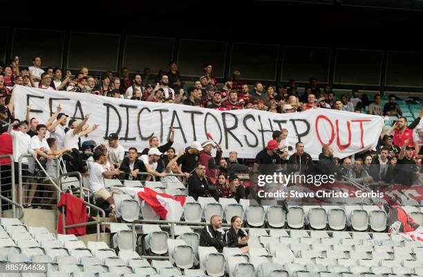 The RBB of the Wanderers hold up a sign stating "FFA Dictatorship Out" during the round nine A-League match between the Western Sydney Wanderers and...