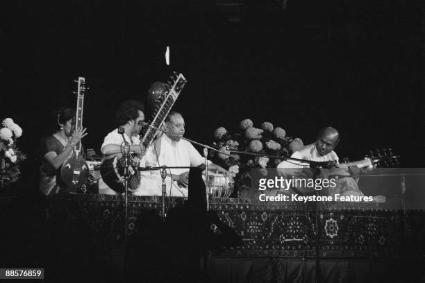 Tanpura player Kamala Chakravarty, sitar player Ravi Shankar, tabla player Alla Rakha and sarod player Ali Akbar Khan performing at The Concert for...