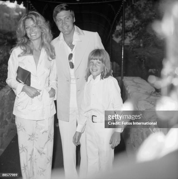 Just-married American actors Farrah Fawcett and Lee Majors, along with Majors' son from a previous marriage, Lee Majors II, pose together at the...