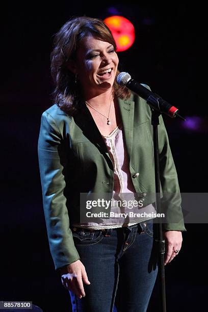 Comedian Kathleen Madigan performs on stage at the "Let Freedom Hum: An Evening of Comedy hosted by Martin Short" show during TBS presents A Very...
