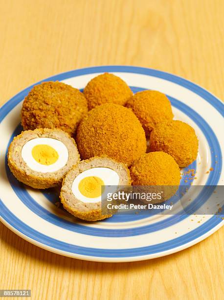 scotch eggs on plate. - scotch egg stock pictures, royalty-free photos & images