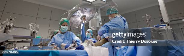 surgeons - open heart surgery stock pictures, royalty-free photos & images