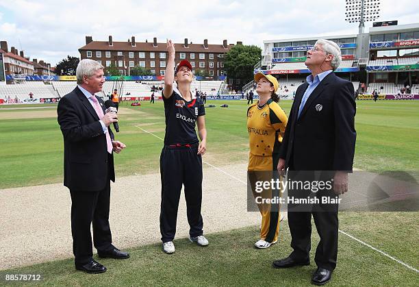 Charlotte Edwards of England tosses the coin watched by Karen Rolton of Australia during the ICC Women's World Twenty20 Semi Final between England...