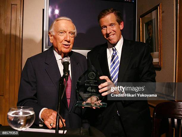 Brian Williams of NBC News and Walter Cronkite