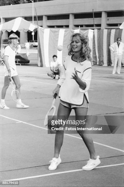 American actress Farrah Fawcett on the court at a Cedars-Sinai Medical Center charity tennis tournament, Hollywood, California, September 1976.
