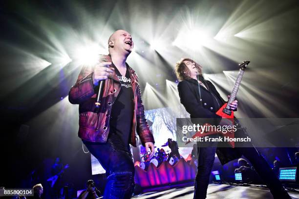 Michael Kiske and Sascha Gerstner of the German band Helloween perform live on stage during a concert at the Tempodrom on December 4, 2017 in Berlin,...