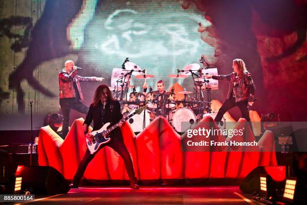 Michael Kiske, Markus Grosskopf, Daniel Loeble and Andi Deris of the German band Helloween perform live on stage during a concert at the Tempodrom on...