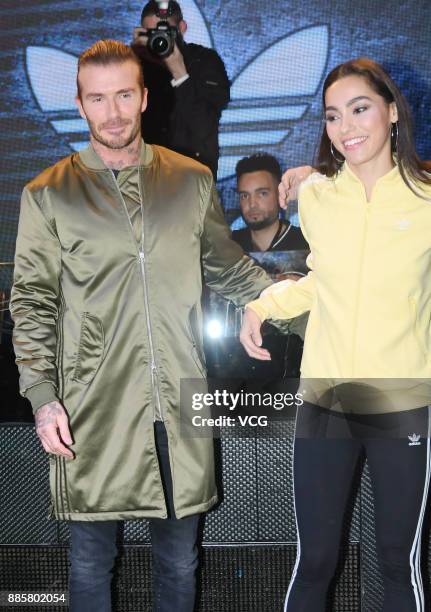 Former footballer David Beckham and model Adrianne Ho attend Adidas Originals event on December 4, 2017 in Shanghai, China.