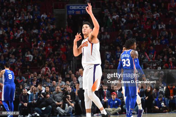 Devin Booker of the Phoenix Suns reacts during the game against the Philadelphia 76ers on December 4, 2017 at Wells Fargo Center in Philadelphia,...