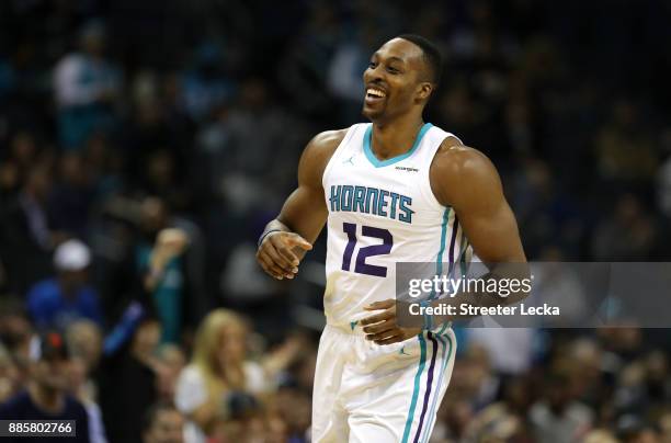 Dwight Howard of the Charlotte Hornets reacts after a play against the Orlando Magic during their game at Spectrum Center on December 4, 2017 in...