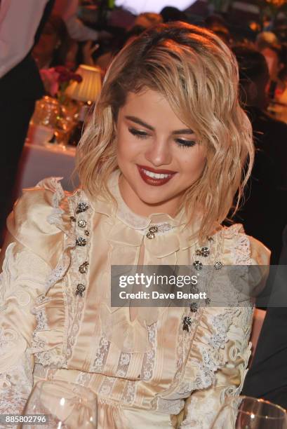 Selena Gomez attend a drinks reception ahead of The Fashion Awards 2017 in partnership with Swarovski at Royal Albert Hall on December 4, 2017 in...