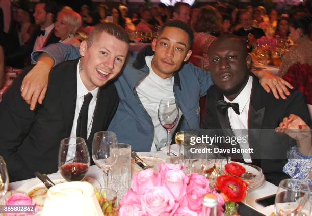 Professor Green, Loyle Carner and Stormzy attend a drinks reception ahead of The Fashion Awards 2017 in partnership with Swarovski at Royal Albert...