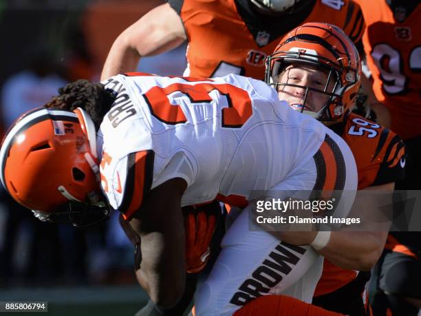Linebacker Nick Vigil of the Cincinnati Bengals tackles running back Isaiah Crowell of the Cleveland Browns in the first quarter of a game on...