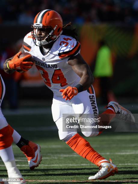 Running back Isaiah Crowell of the Cleveland Browns carries the ball downfield in the first quarter of a game on November 26, 2017 against the...