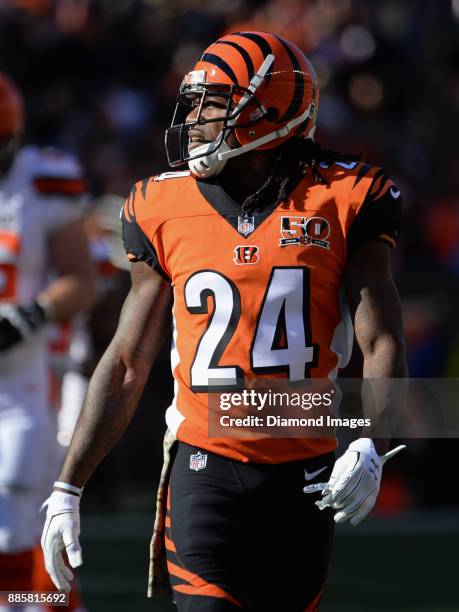 Cornerback Adam Jones of the Cincinnati Bengals walks onto the field in the first quarter of a game on November 26, 2017 against the Cleveland Browns...